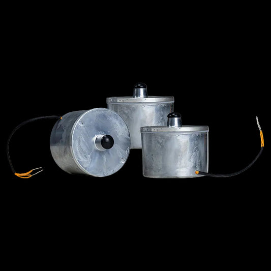 Three metallic cylindrical devices with wires on a white background depicting Iron Fog VisionGuard Refill Cartidges